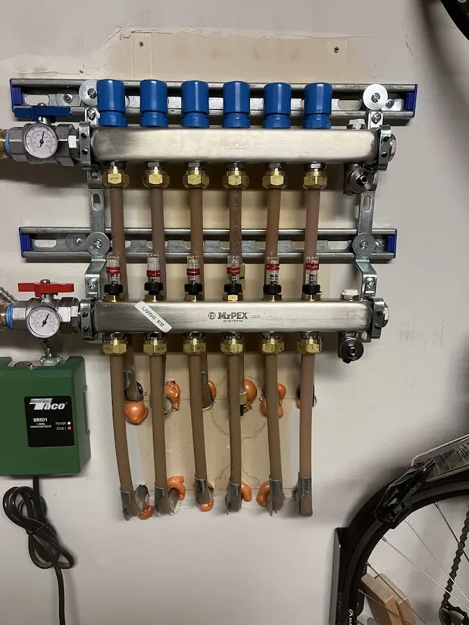 Plumber performing Gas Line Installation at a residential property in Moss Point